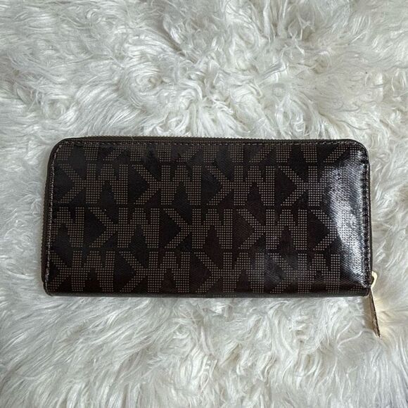 Michael Kors Jet Set
Travel Continental Zip Around Wallet PVC Brown - Picture 3 of 4